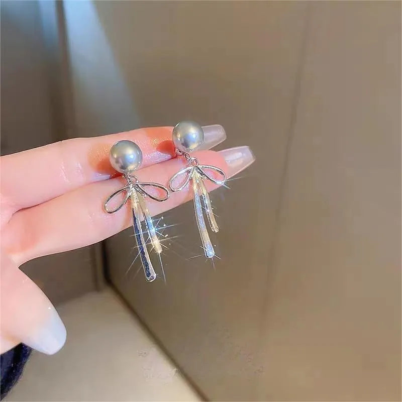 Sterling Silver Bow Pearl Earrings