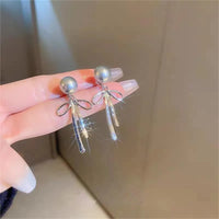 Sterling Silver Bow Pearl Earrings