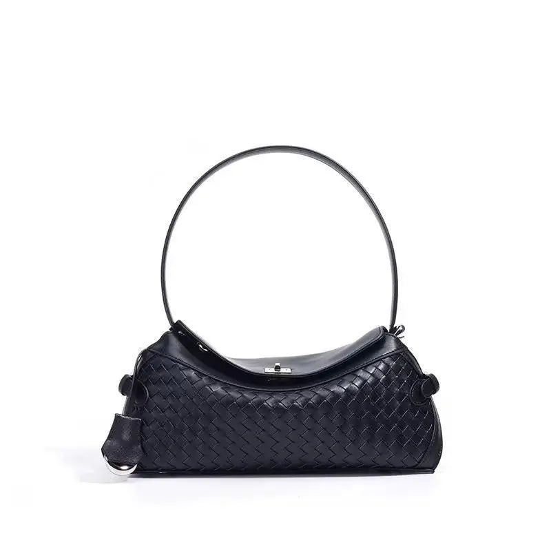 Tania Hird St Margaux Tressage black cowhide bag angled view textured detail