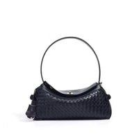 Tania Hird St Margaux Tressage black cowhide bag angled view textured detail