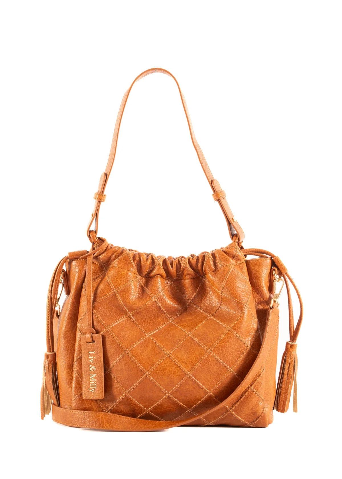Liv and Milly Alexis tan bag styled on shoulder Blue Mountains boutique