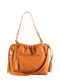Liv and Milly Alexis tan bag styled on shoulder Blue Mountains boutique