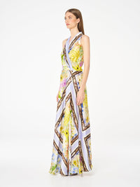 Moss & Spy Alicia Maxi lilac citrus floral, side view showing front split