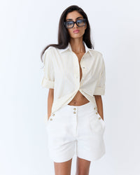 Eder by Anna Madelaine Short in off white canvas