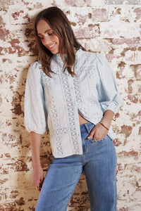 Kireina Isabella Shirt in Powder Blue, side view showing embroidered elbow-length sleeves