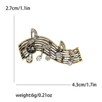 Retro Rhinestone Notes Pin