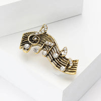 Retro Rhinestone Notes Pin